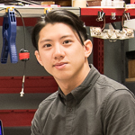 Headshot of Justin Ho.