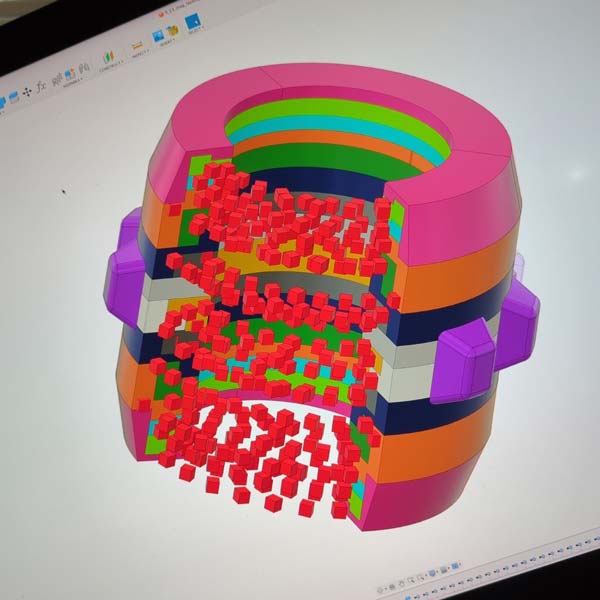 A computer model of the Halbach array seen in a photo.