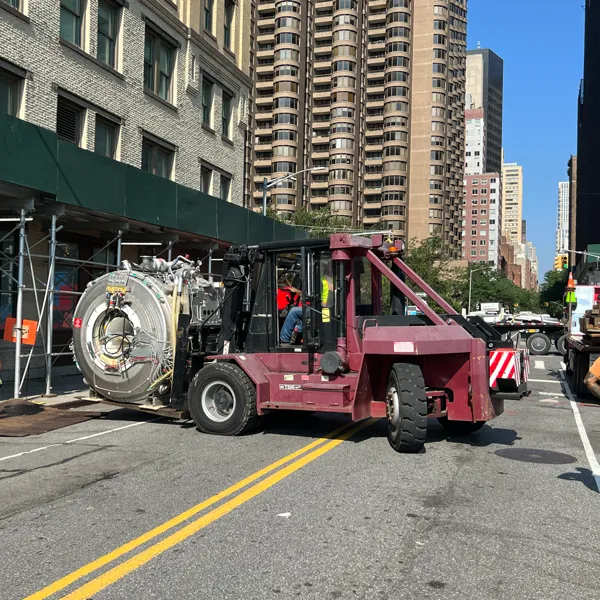 Photo: Forklift removing an MRI magnet from a building in Manhattan.