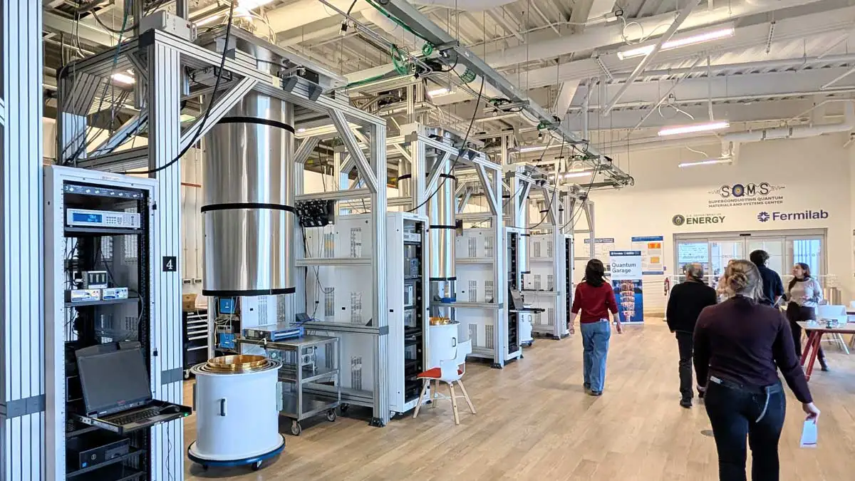 Photo: a row of dilution refrigerators in the SQMS Center's Quantum Garage.